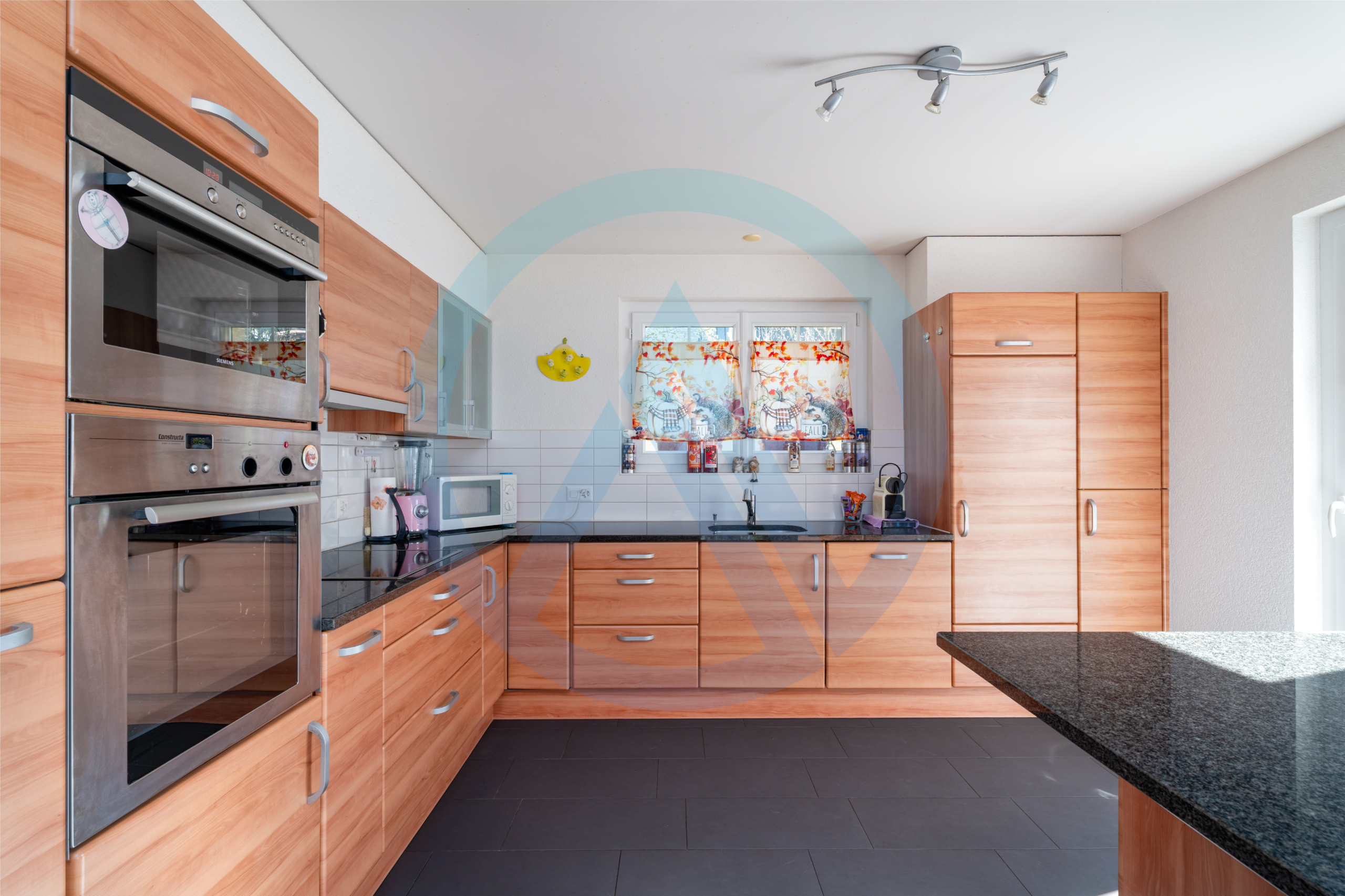 AO immobilier cuisine ouverte parfaitement agencée, dans villa individuelle à Ursy dans le canton de Fribourg